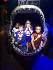 same kids in a shark's mouth