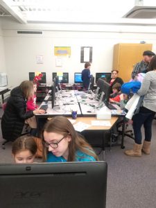 families in computer lab taking AR Tests