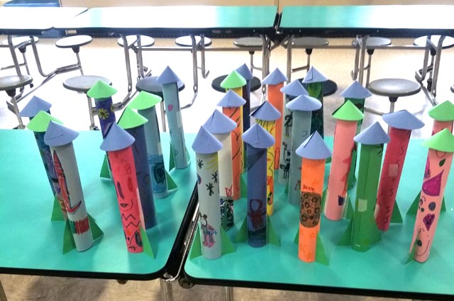 completed colored paper rocket ships