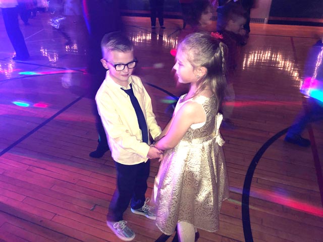 two students dancing