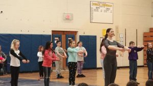 students practicing ballet moves