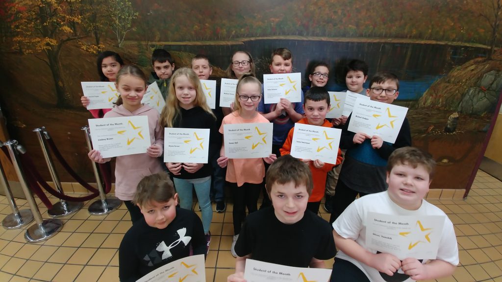 group photo of students holding certificates