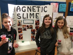 students with their magnetic slime project