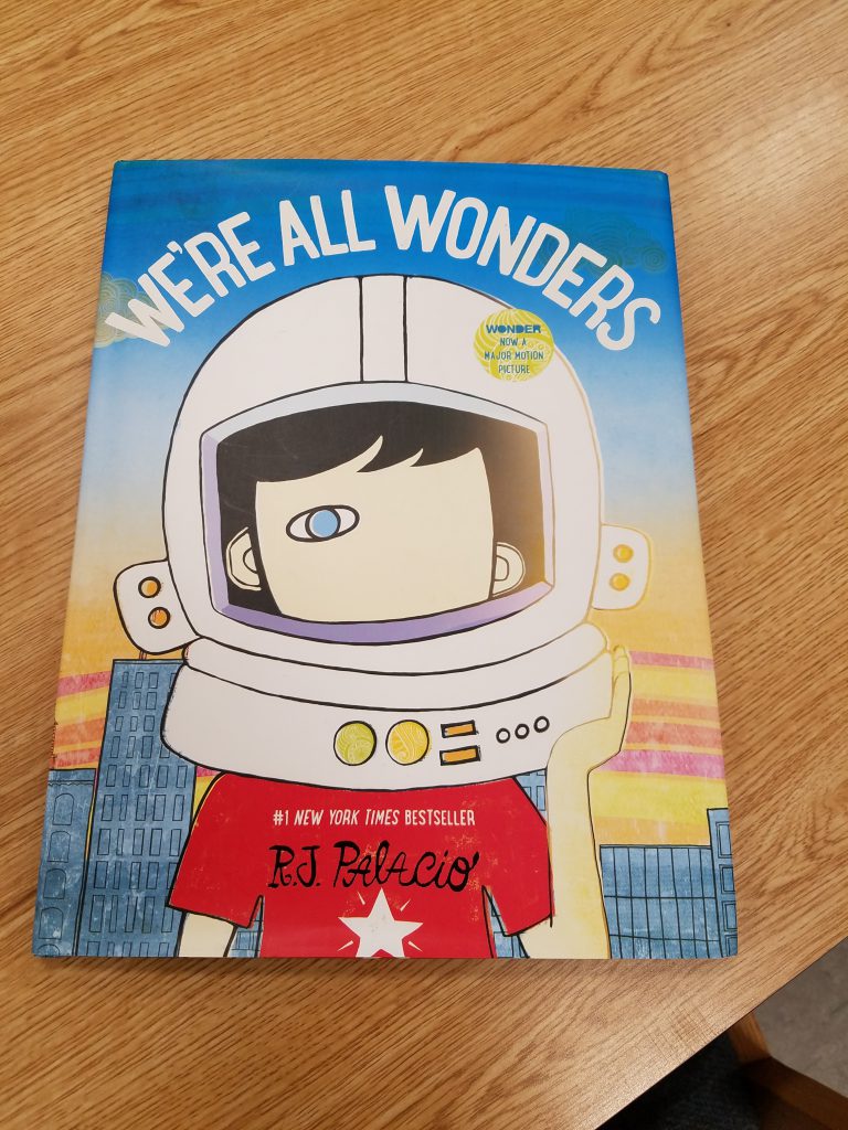 the cover of the book "We're All Wonders"