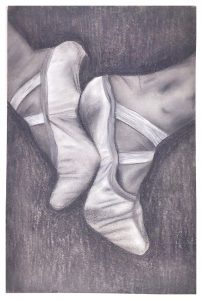 a black and white hand-drawn picutre of ballet slippers