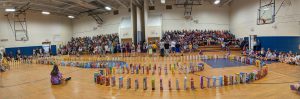 a maze of cereal boxes is set up in a gymnasium