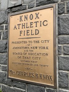 a gold plaque honoring the people who donated Knox Athletic Field