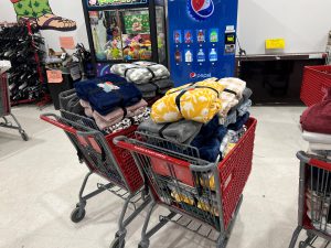 shopping carts filled with items purchased for donation