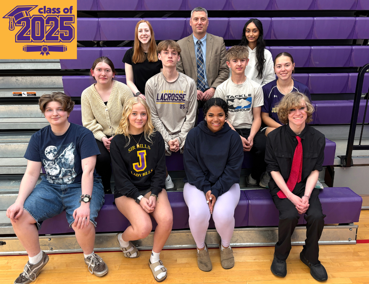 ten students sit on purple gym bleachers with an adult man
