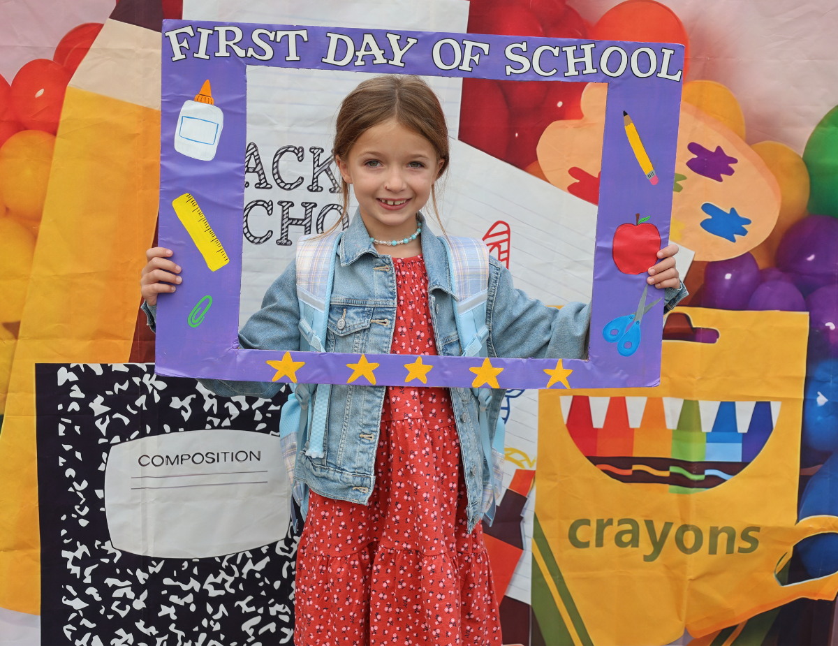 a young girl wearing a dress poses in front of a montage for the first day of school