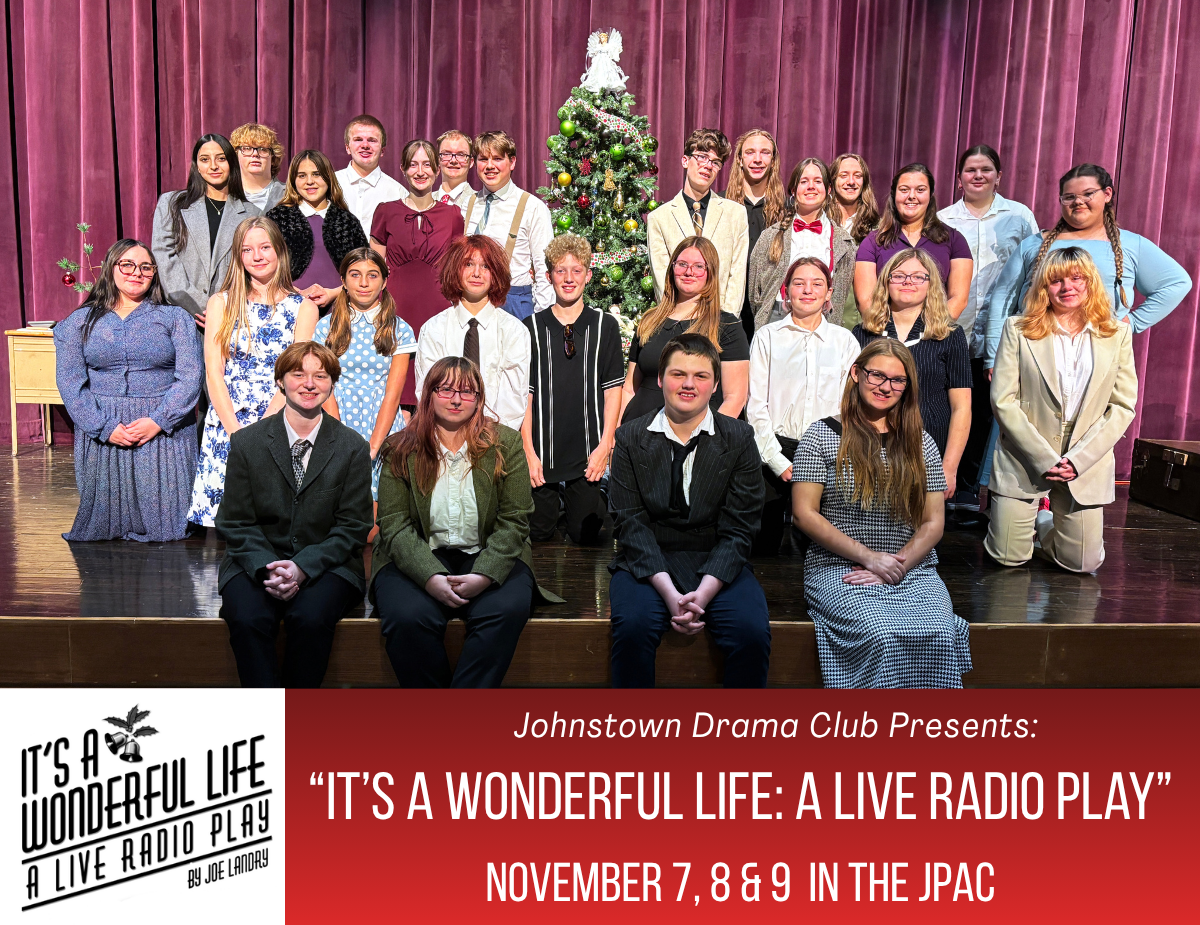 a group of young actors pose on a stage