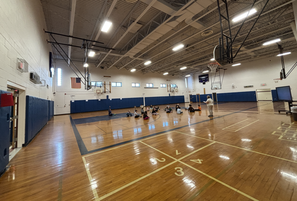 a wide view of a newly painted gymnasium