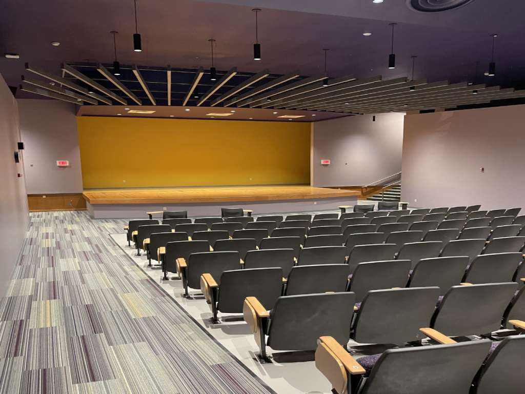 a gold and purple auditorium