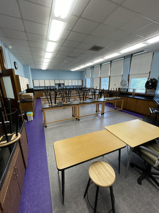 a classroom shows new purple and grey floor
